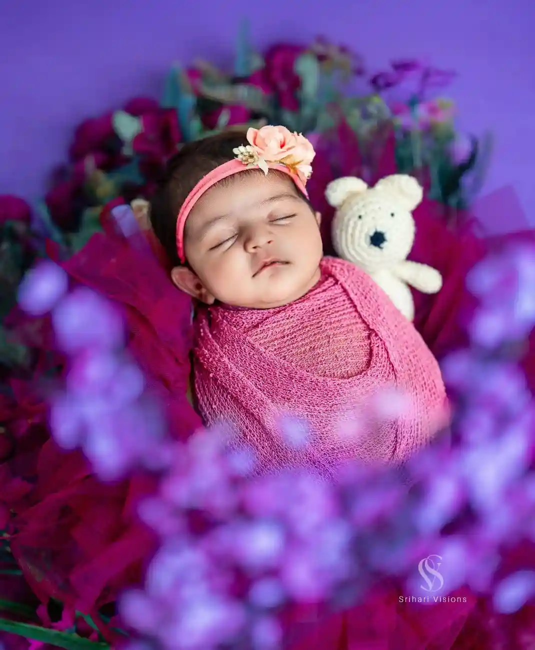 Cute newborn baby wrapped in a warm blanket