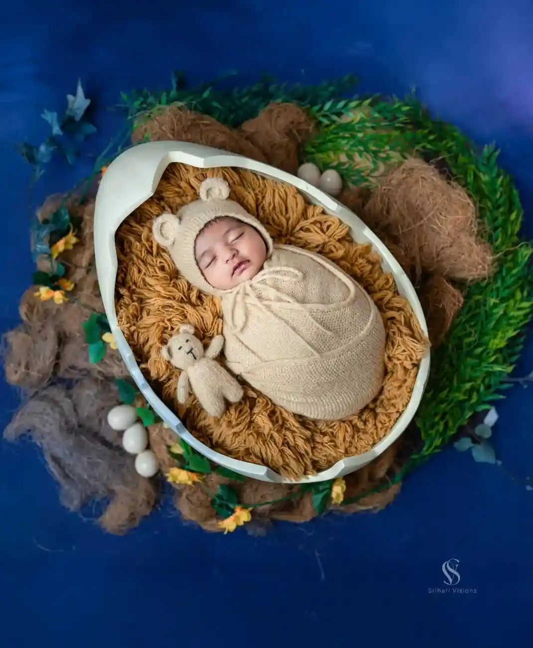 Newborn baby lying peacefully during newborn baby photoshoot