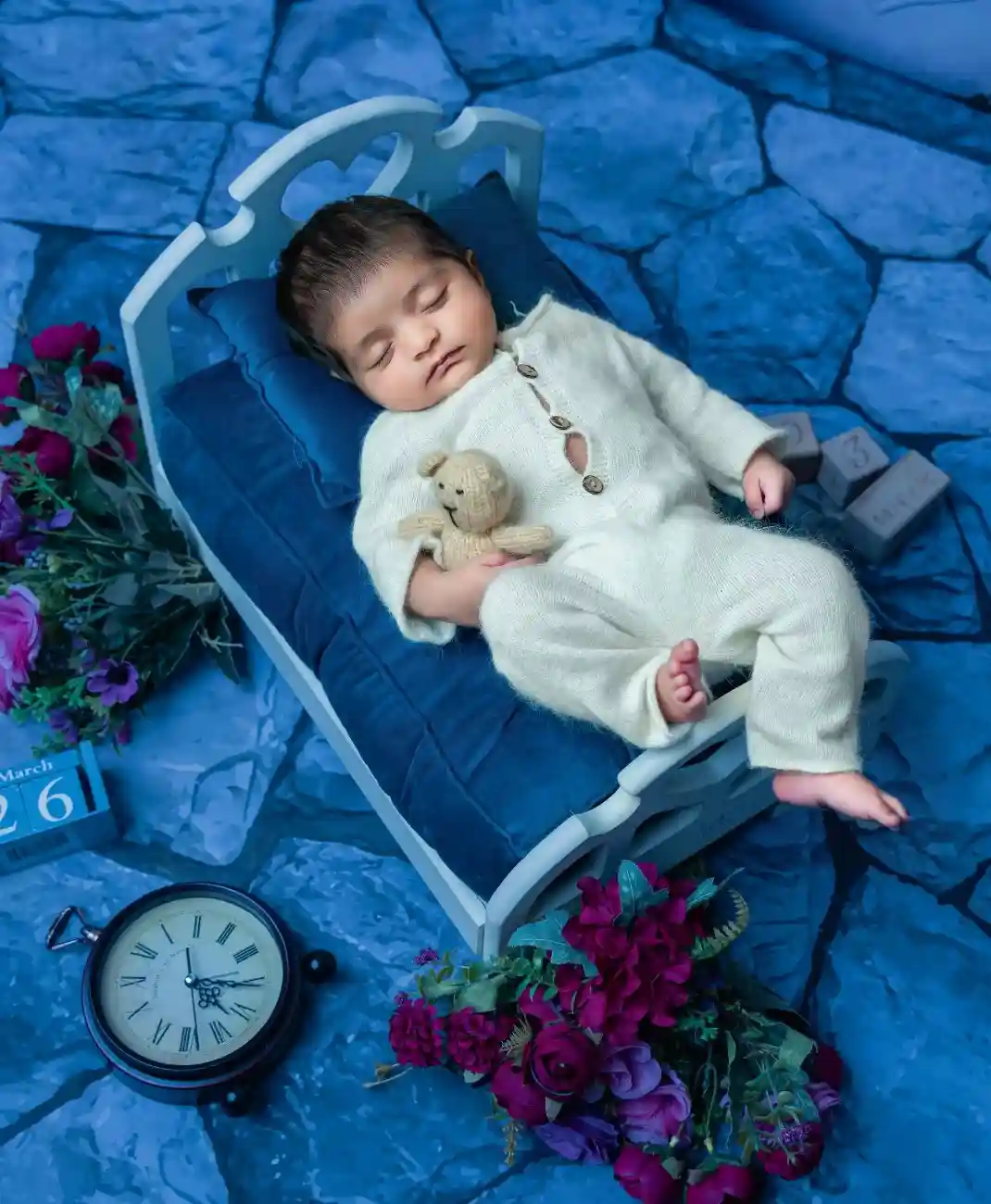 Sweet sleeping baby during newborn baby photoshoot
