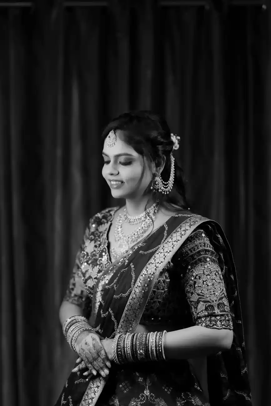 Bride posing with traditional South Indian styling
