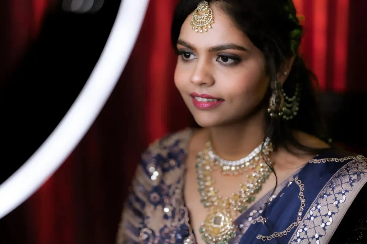 Bride smiling in an elegant engagement photoshoot