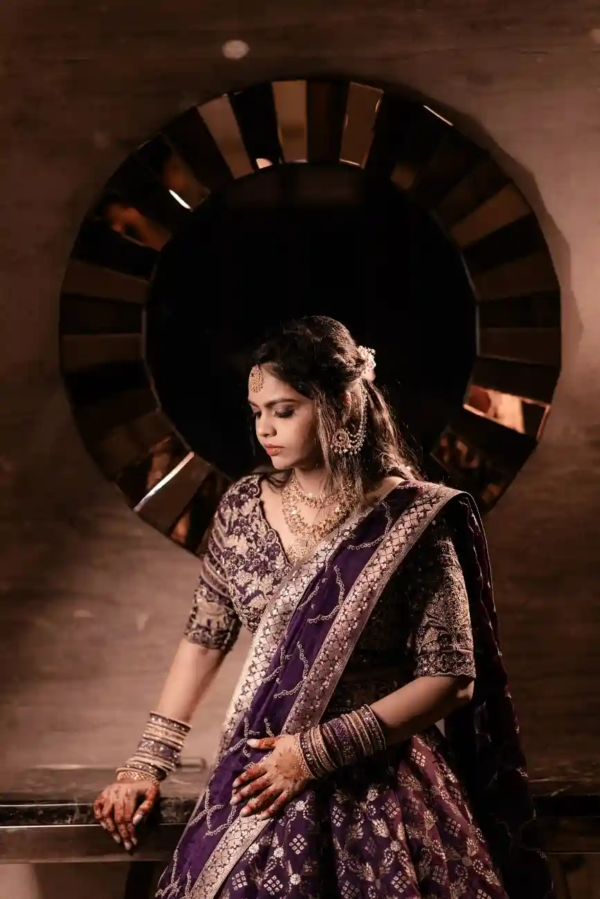 Bride posing with traditional jewellery at engagement