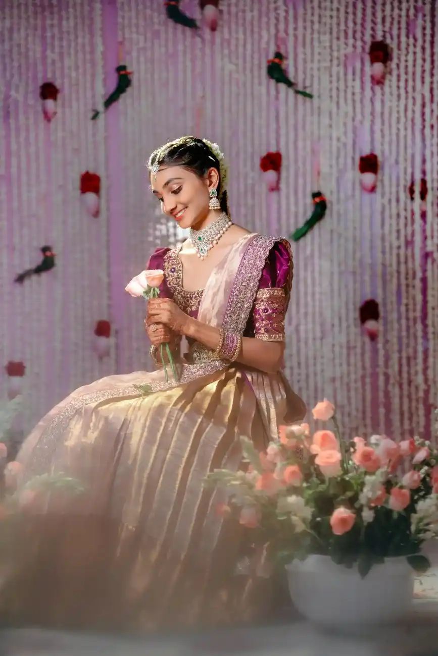 Girl smiling in an elegant half saree outfit