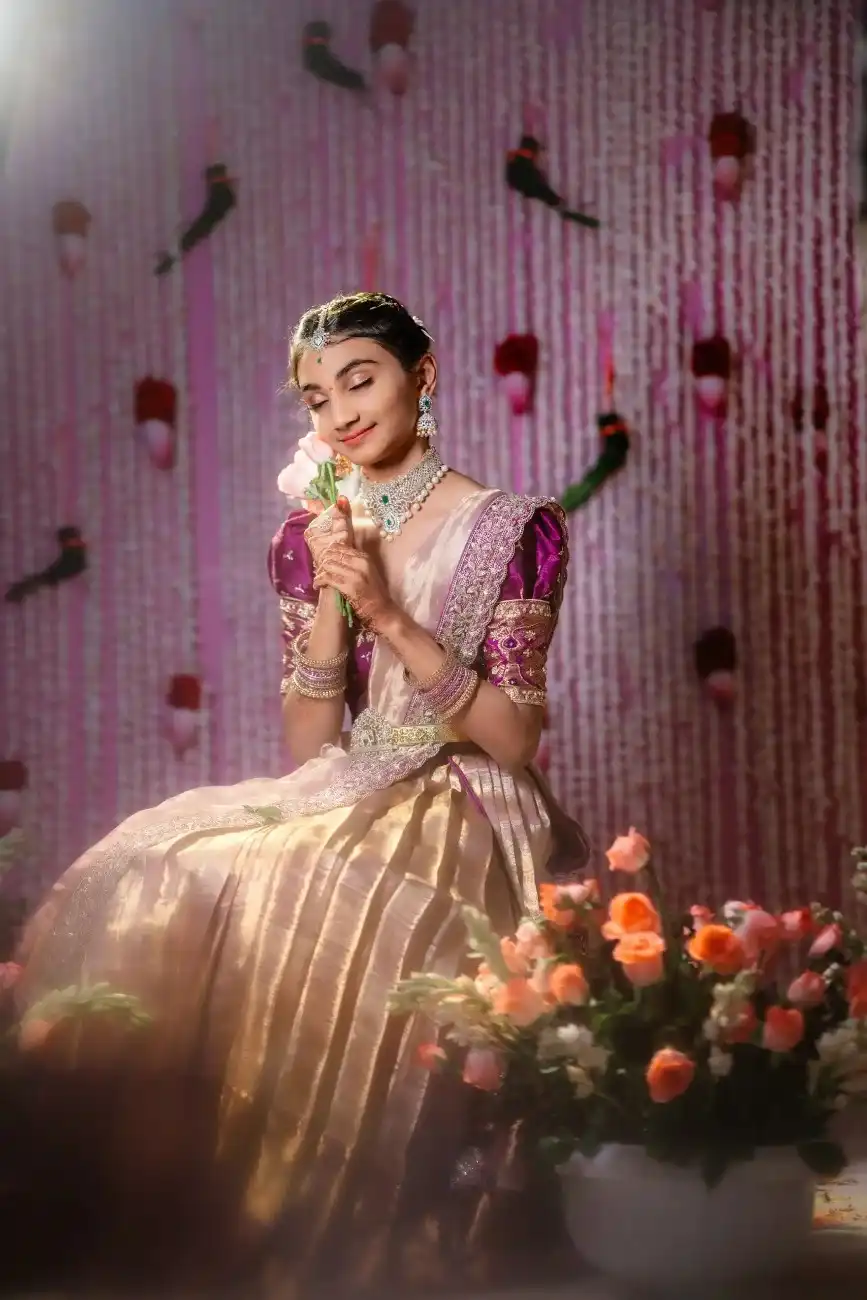 Traditional girl posing at a half saree photoshoot