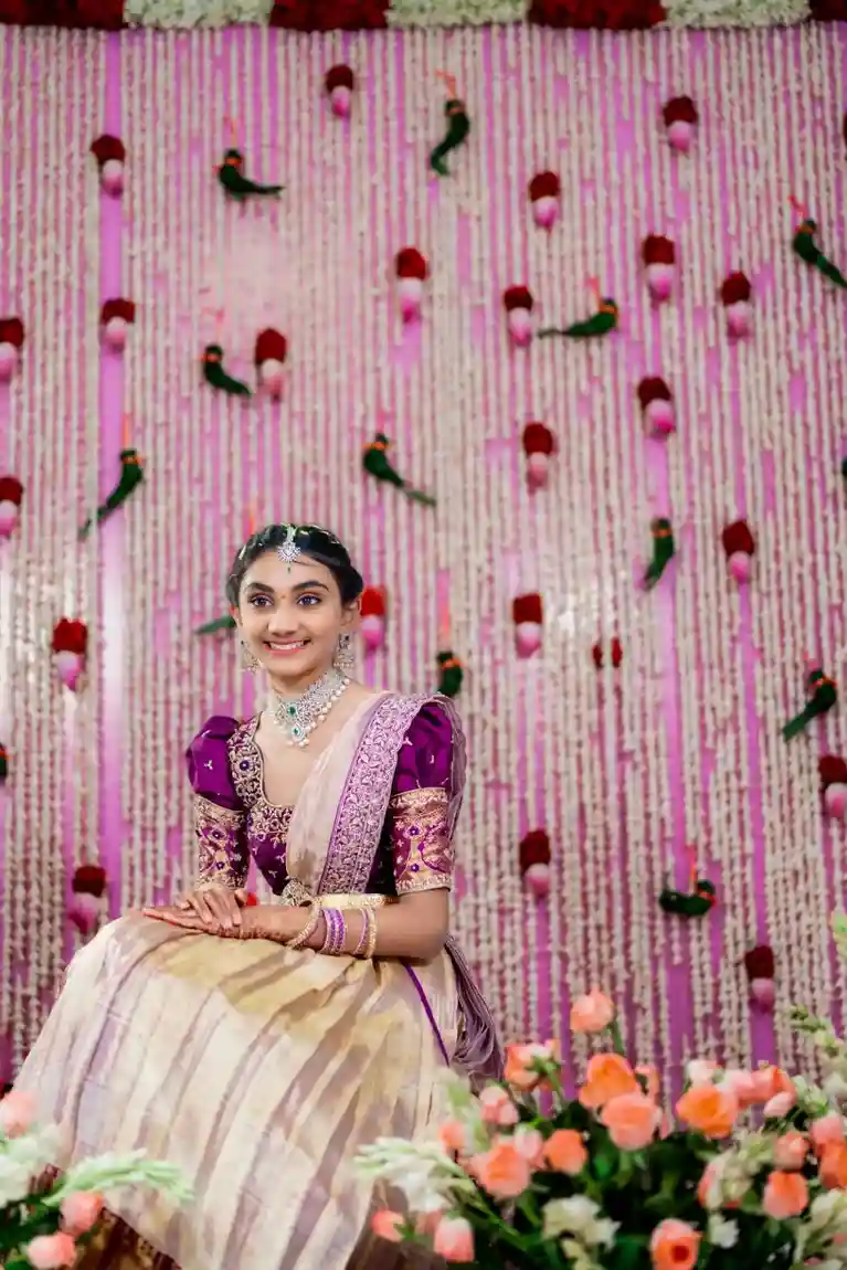 Girl smiling naturally during half saree photoshoot