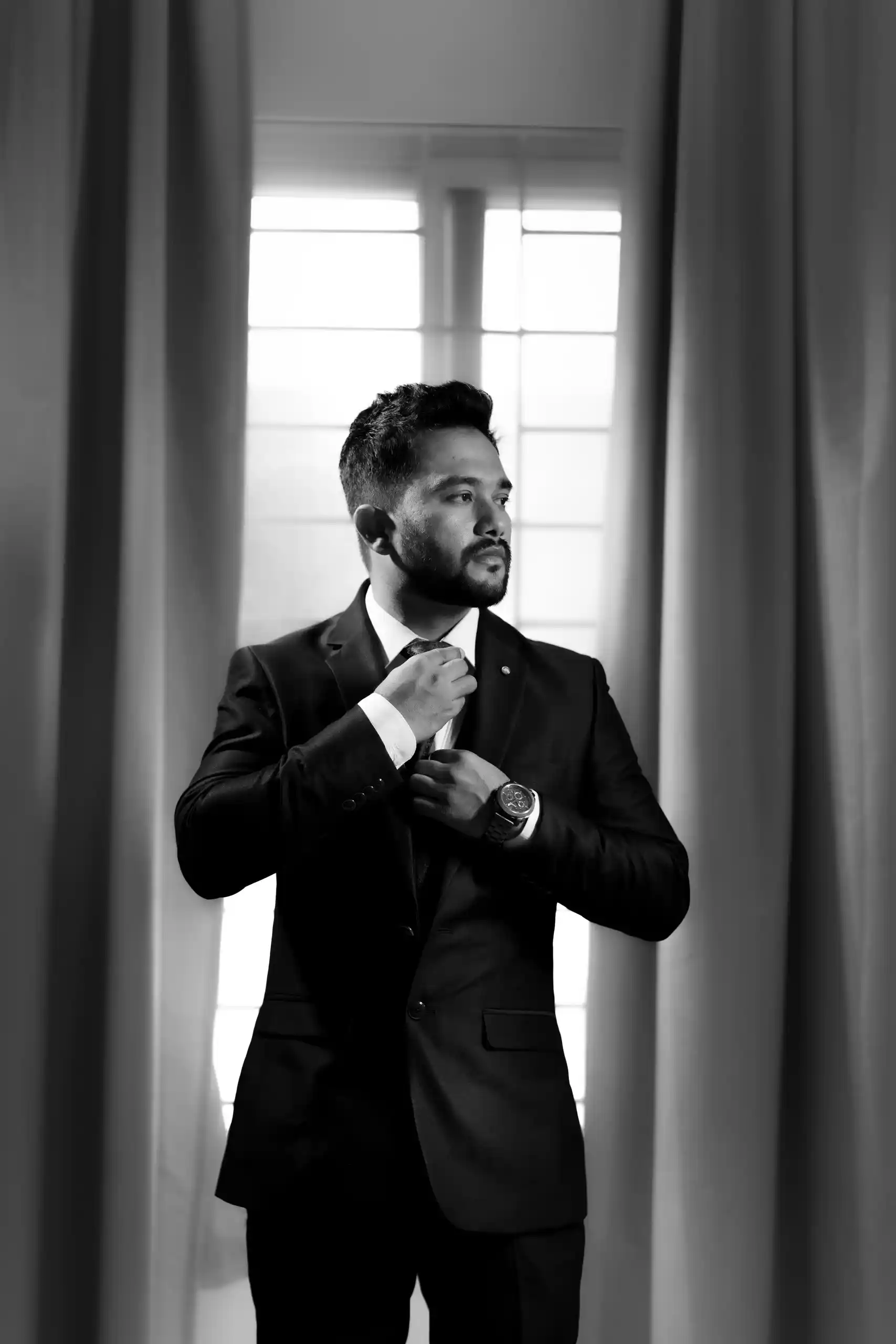 Groom portrait in elegant engagement outfit