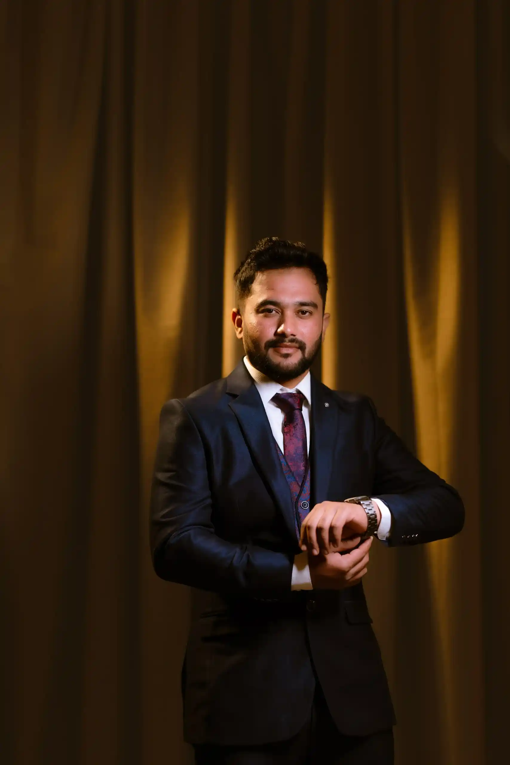 Groom portrait with warm golden lighting