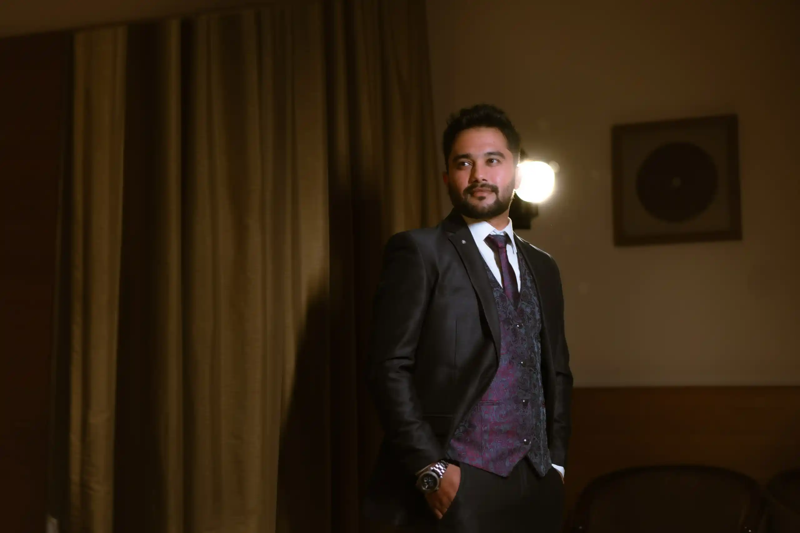 Handsome groom portrait captured by engagement photographer
