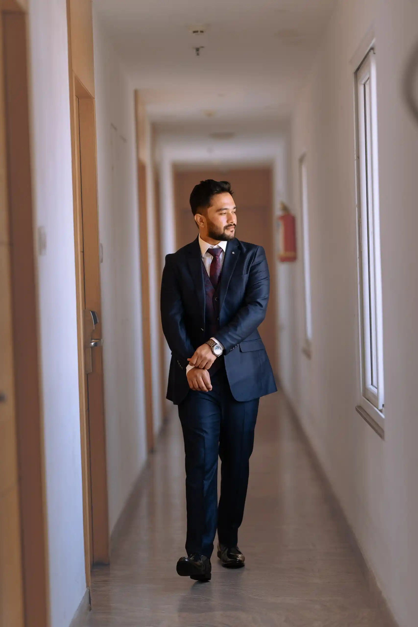 Groom candid portrait captured at engagement ceremony
