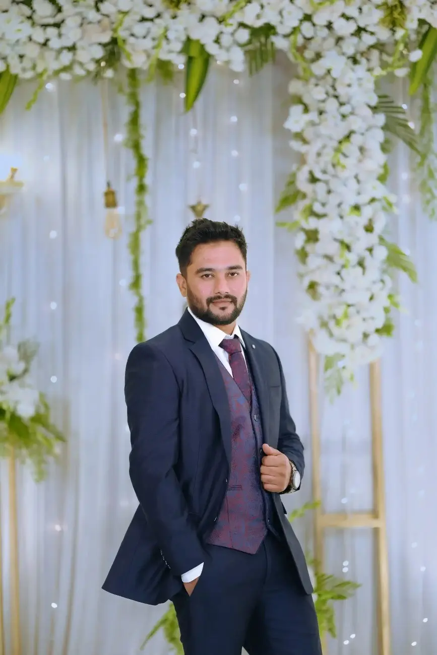 Groom portrait with floral decorations