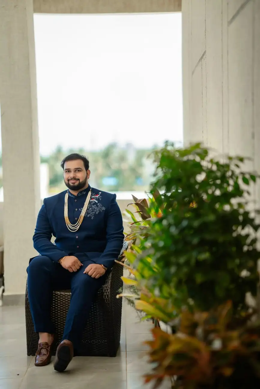 Groom portrait with traditional jewellery details