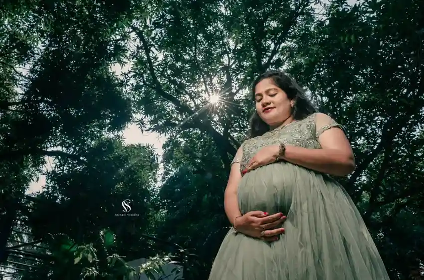 Beautiful couple maternity portrait captured by professional photographer