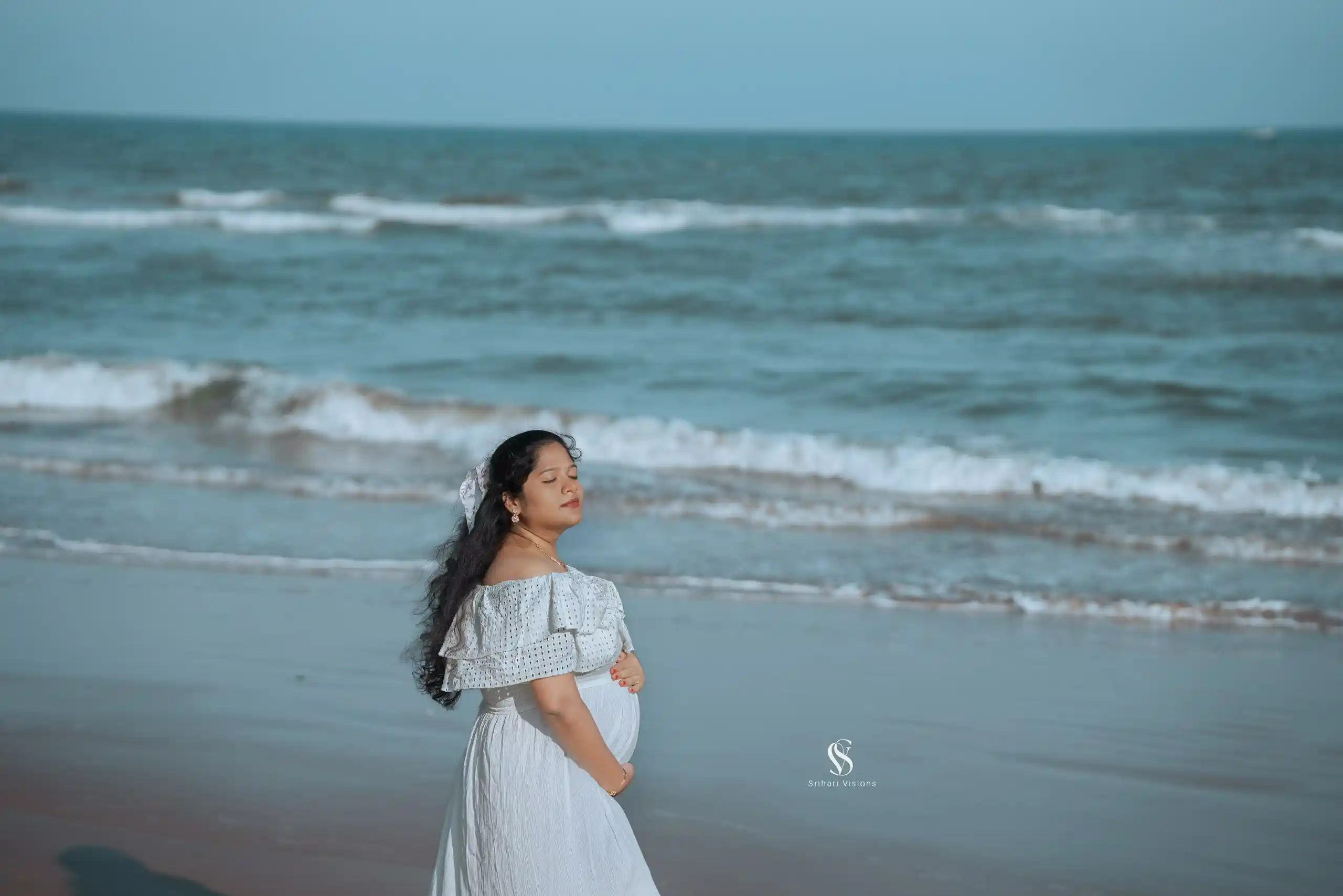 Husband and pregnant wife sharing an emotional maternity moment