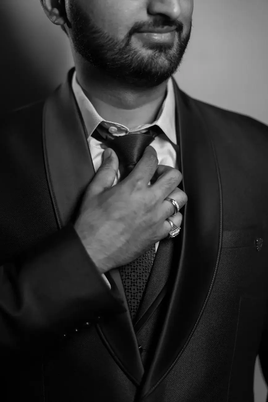Elegant groom portrait at engagement celebration