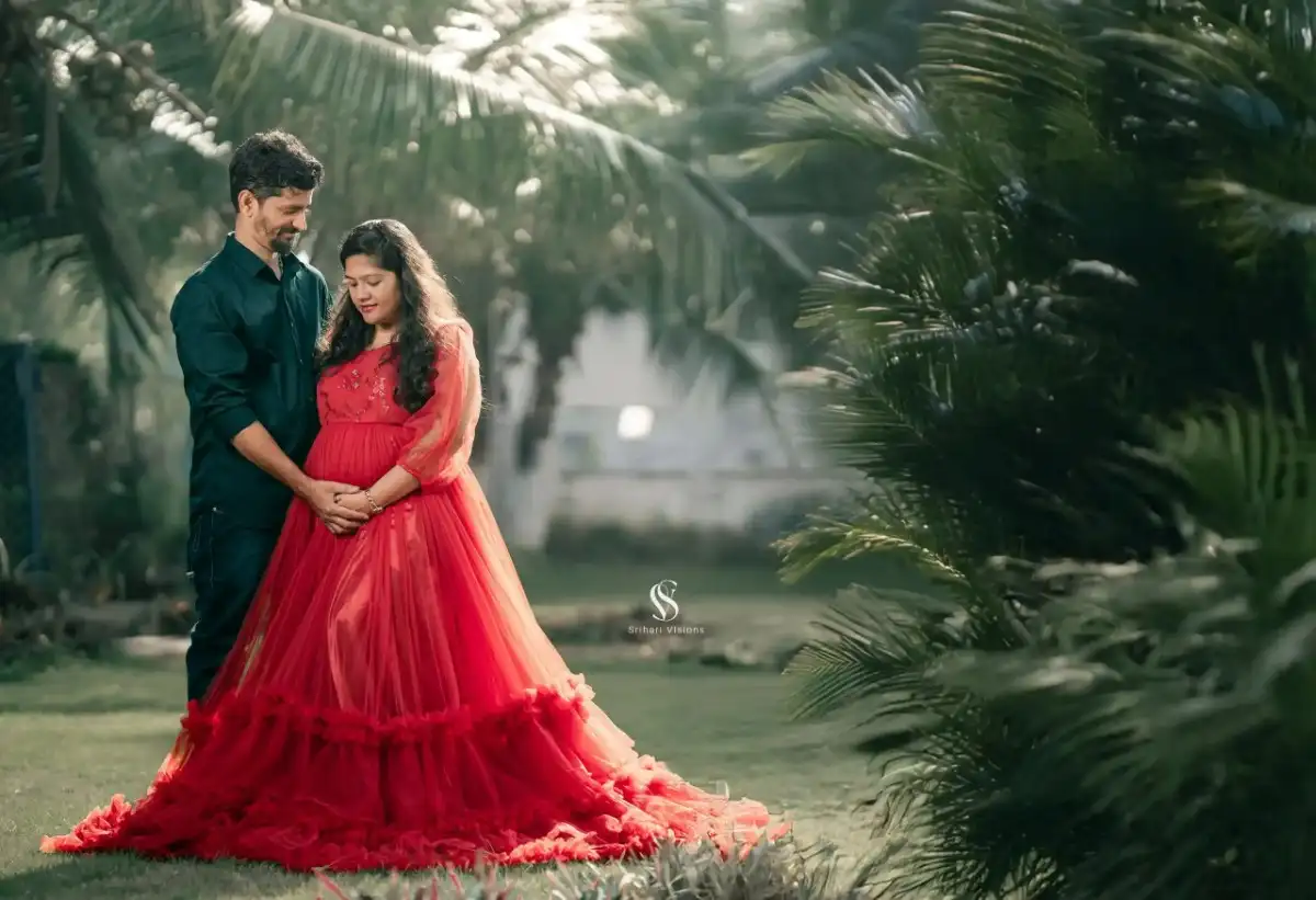 Couple posing together during maternity photography