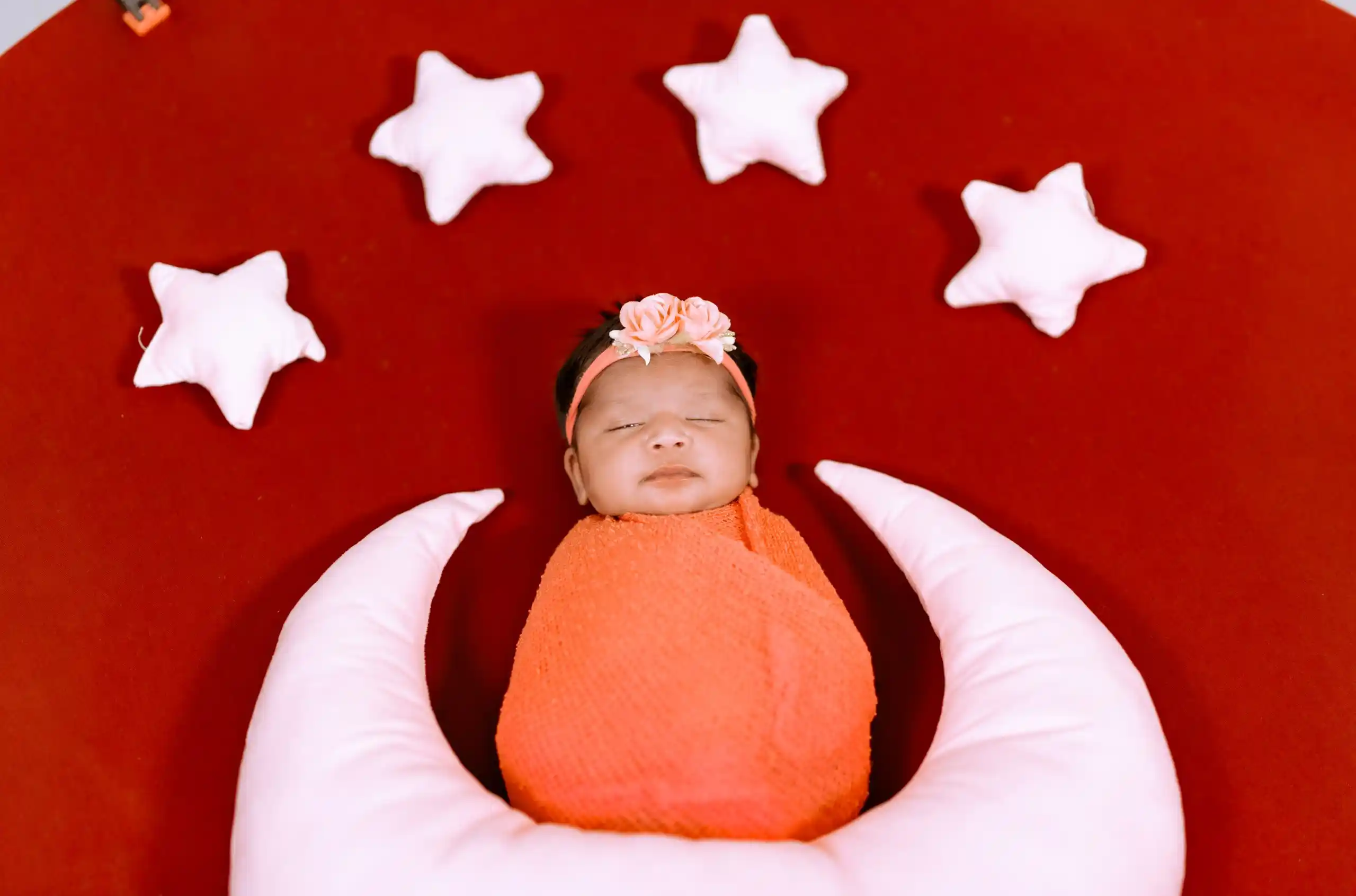 Newborn baby photoshoot with elegant themed decorations