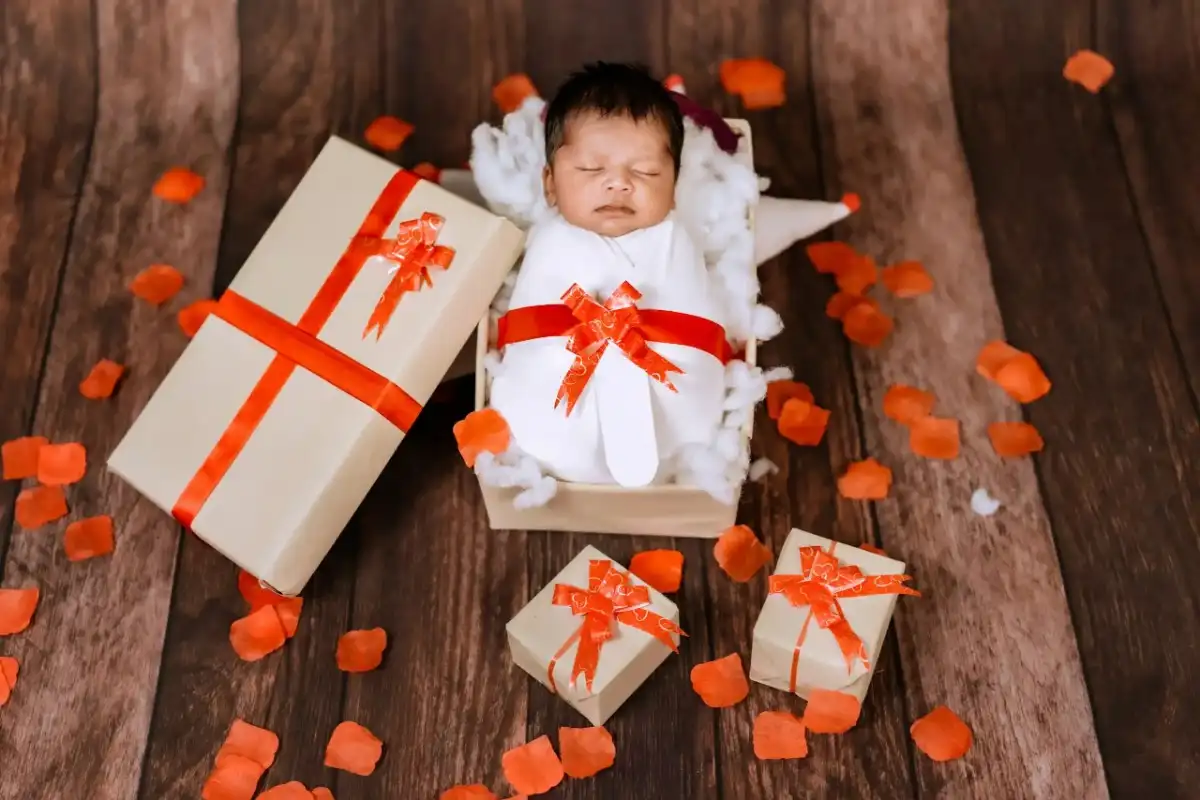 Newborn baby sleeping comfortably during photoshoot